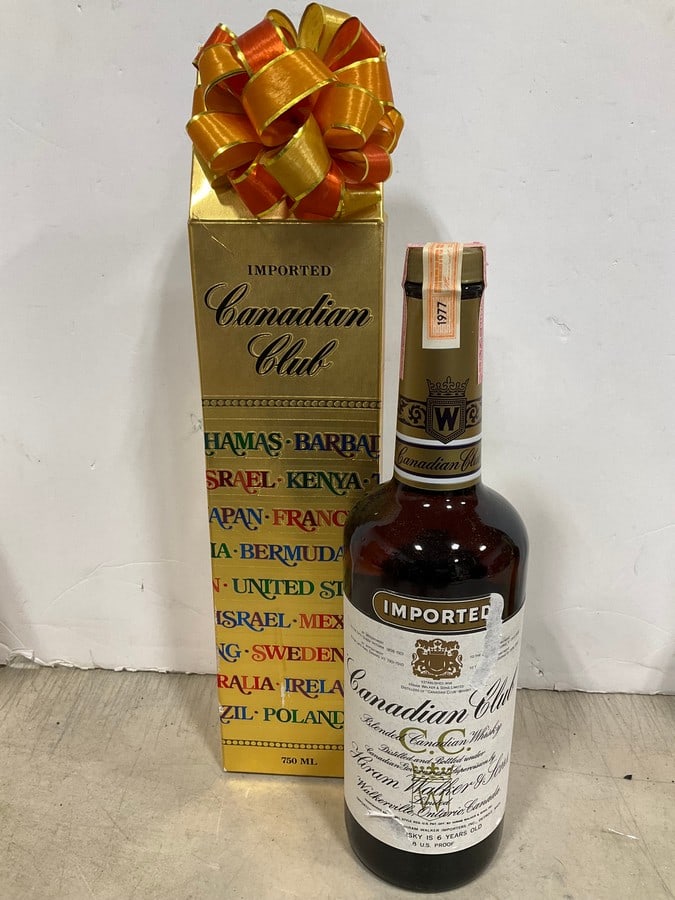 1977 Canadian Club Blended Whiskey/6 year sealed in box(750mL): Any contents in bottle is Free; You are bidding on the bottle & unbroken tax stamp
