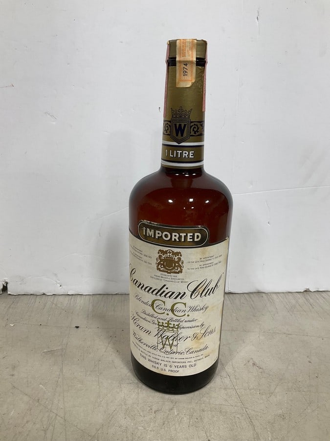 1974 Canadian Club Blended Whiskey/6 year(1L): Any contents in bottle is Free; You are bidding on the bottle & unbroken tax stamp