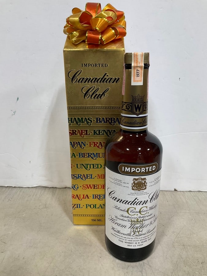 1977 Canadian Club Blended Whiskey/6 year sealed in box(750mL): Any contents in bottle is Free; You are bidding on the bottle & unbroken tax stamp