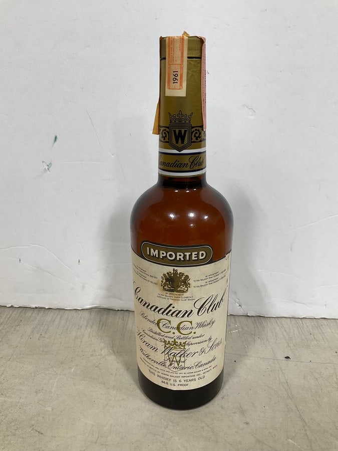 1961 Canadian Club Blended Whiskey/6 year sealed(750mL): Any contents in bottle is Free; You are bidding on the bottle & unbroken tax stamp