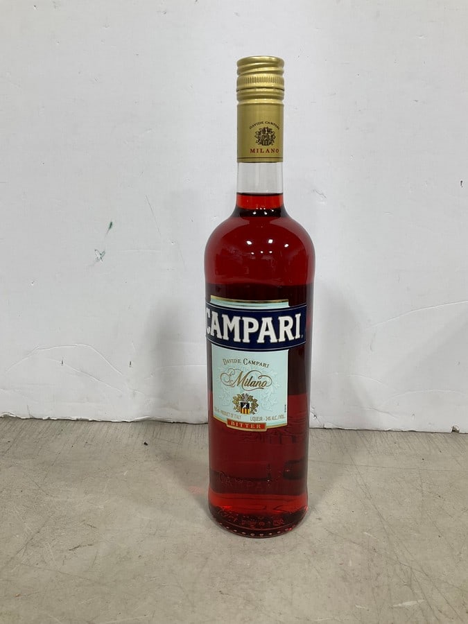 Campari liqueur(750mL): Any contents in bottle is Free; You are bidding on the bottle & unbroken tax stamp