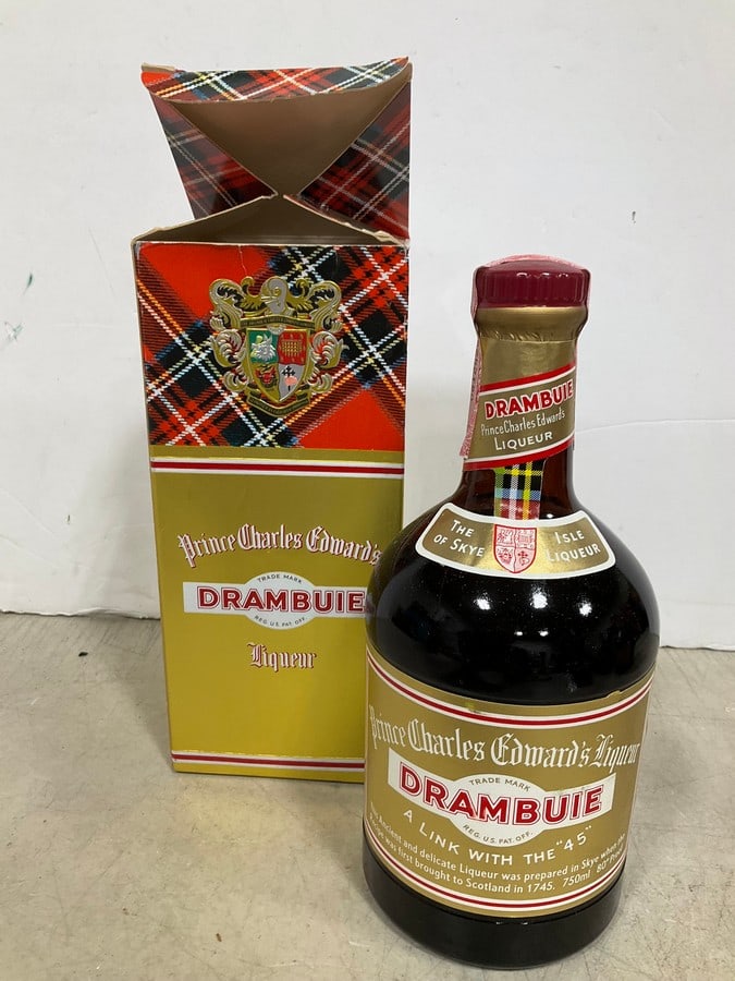 1980's Prince Charles Edward's Drambuie liqueur in box(750mL): Any contents in bottle is Free; You are bidding on the bottle & unbroken tax stamp