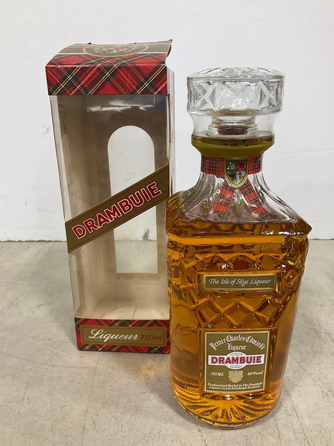 1980's Prince Charles Edward's Drambuie liqueur in box(750mL): Any contents in bottle is Free; You are bidding on the bottle & unbroken tax stamp