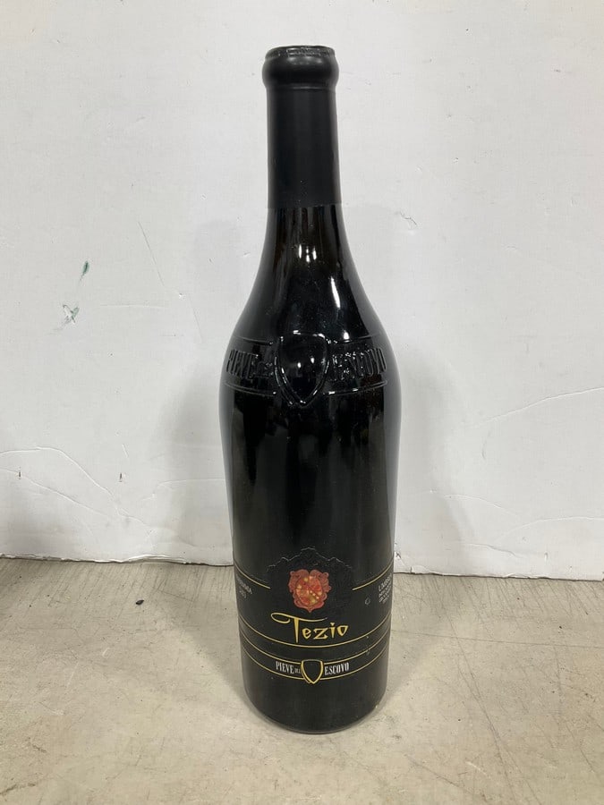2003 Tezio red wine(750mL): Any contents in bottle is Free; You are bidding on the bottle & unbroken tax stamp