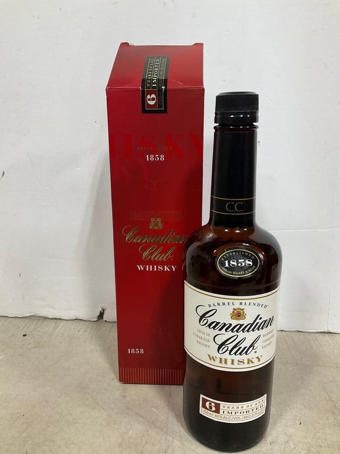 Canadian Club Whisky in box(750mL): Any contents in bottle is Free; You are bidding on the bottle & unbroken tax stamp