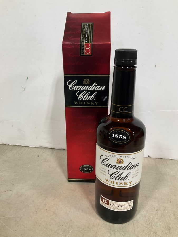 Canadian Club Whisky in box(750mL): Any contents in bottle is Free; You are bidding on the bottle & unbroken tax stamp