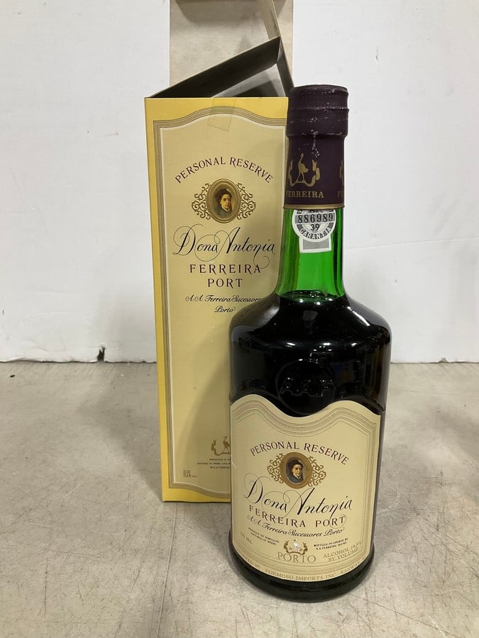 Dona Antonia liqueur in box(750mL): Any contents in bottle is Free; You are bidding on the bottle & unbroken tax stamp