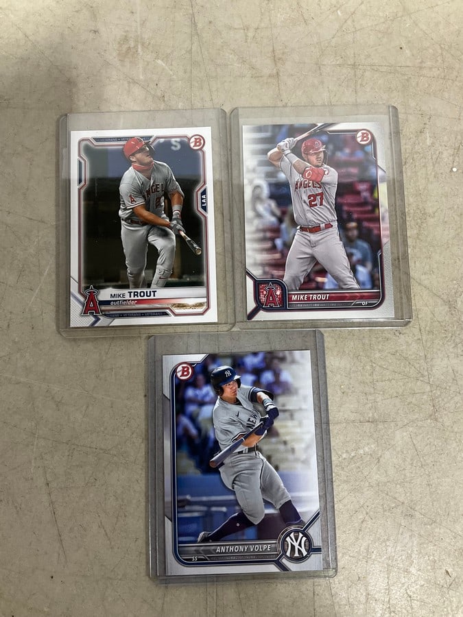 Anthony Volpe and Mike Trout collectible cards in covers: Anthony Volpe and Mike Trout collectible cards in covers