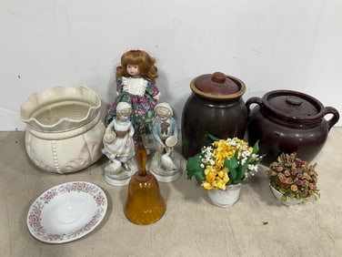 Crockpots, decorative statues, vintage doll, and more