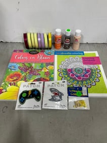 Coloring books, iron on patches, and various ribbon/paints
