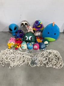 Various dolls, doll hanging hammock wall decor, and more