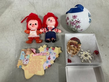 Raggedy Ann dolls, Christmas ornaments, and more
