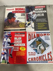Various sports stats books