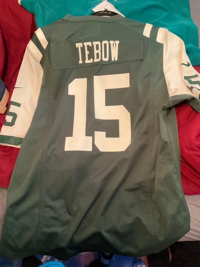 New York Jets Jersey # 15 Tebow Size L Licensed Official NFL Product (does have small stain on right: New York Jets Jersey # 15 Tebow Size L Licensed Official NFL Product (does have small stain on right sleeve)