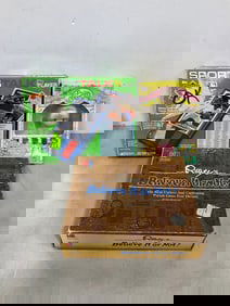 Sports Talk player, Ripley's Believe it or not game, and Precious Moments collectible