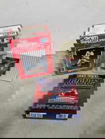 NY Giants 2001 calendar, Sports Impressions Will Clark collectible figure, and more