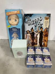 Precious Moments collectible, The Wizard of Oz jigsaw puzzle, and more