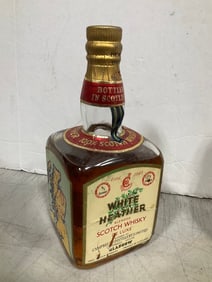 White Heather scotch whisky de luxe(4/5 quart-94 proof-mostly full)