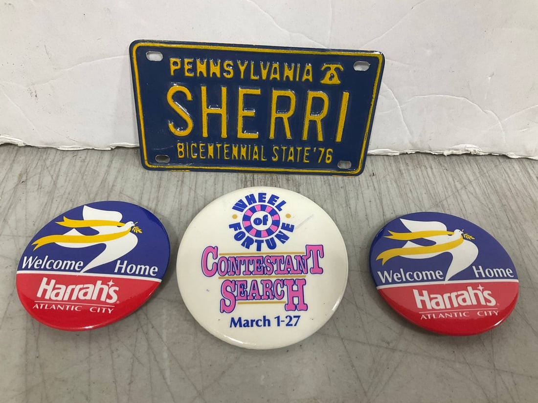 Vintage pins and license plate decor: Vintage pins and license plate decor