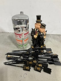 Vintage ceramic Laurel and Hardy decanter(empty), stirrers, and cocktail shaker