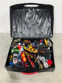 Various toy cars in carrying case