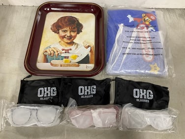 Nintendo inflatable chair, vintage tray, and OXG glasses with carrying cases