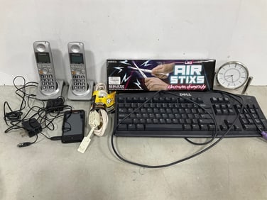 Air Stixs electronic drumsticks, Panasonic home phones, clock with display stand, and more