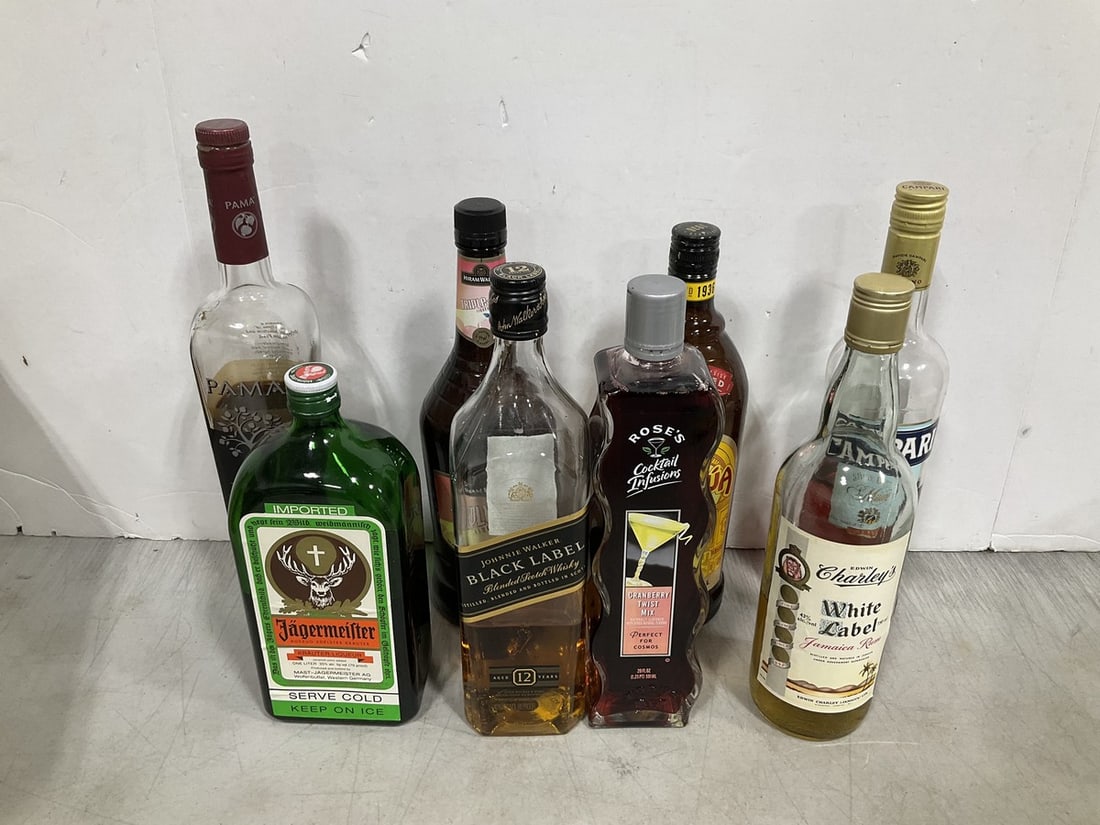 Lot of alcohol(Kahlua, Johnnie Walker black label, and more-different amounts in each) (1 of 1)