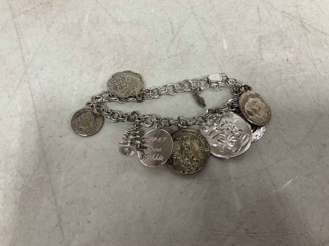 Sterling charm bracelet: Sterling charm bracelet