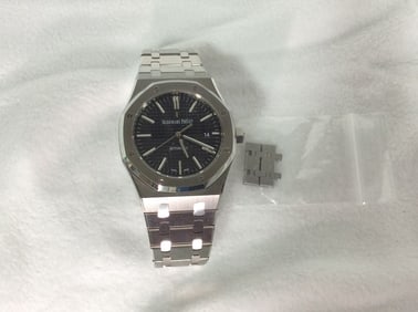Preowned Audemars Piguet Royal Oak Staniless steel black dial from prominent doctor's