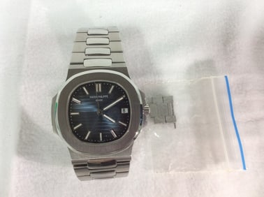 Preowned Patek Philippe Nautilus ref.5711/1A-010 stainless steel wristwatch with date,bracelet, and