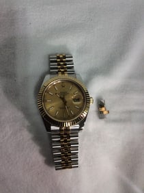 Preowned Rolex fluted bezel, champagne dial, Jubilee bracelet from prominent doctor's