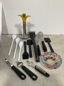 Pineapple cutter, glass ashtray, and various kitchen utensils