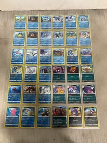 Various Pokemon Cards in Sheets
