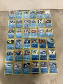 Various Pokemon Cards in Sheets