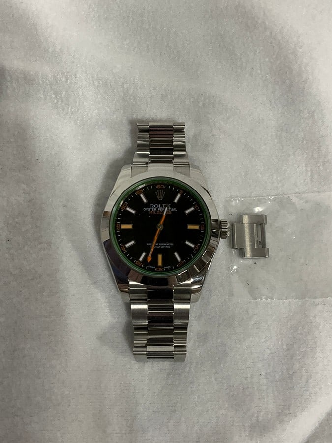 Preowned Rolex Milgauss watch READ DESCRIPTION: Preowned Rolex Milgauss Ref 116400 Black dial watch (No Box, No Papers, Not Authenticate, Likely a Super Rep, Complete your Own Due Diligence, Sold As is Where is)