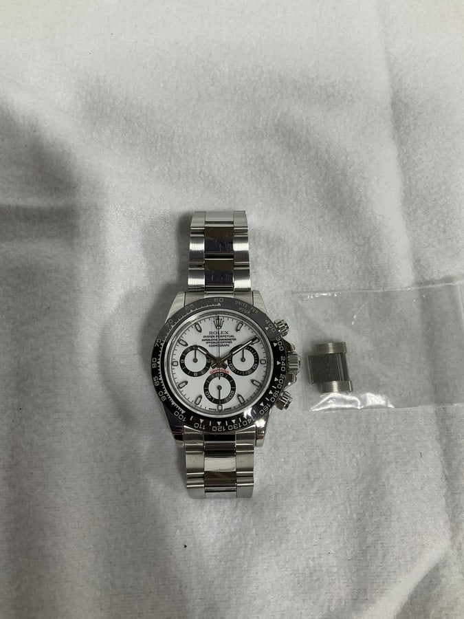 Preowned Rolex Daytona white dial watch READ DESCRIPTION: Preowned Rolex Daytona white dial 116500 steel oyster/rolex panda from prominent doctor's collection (No Box, No Papers, Not Authenticate, Likely a Super Rep, Complete your Own Due Diligence, Sold As