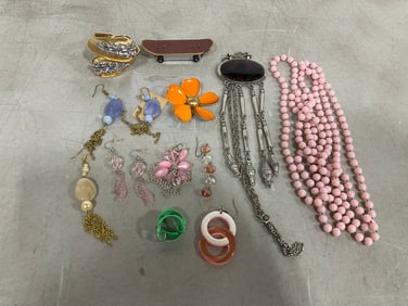 Costume jewelry and skateboard lighter
