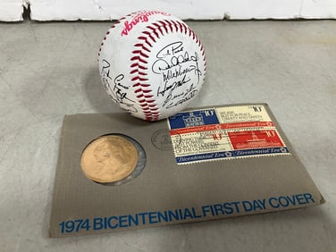 Rawlings autographs printed on ball and stamps/medallion