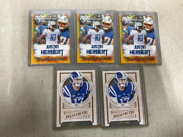Football collectible cards(Justin Herbert/Daniel Jones)