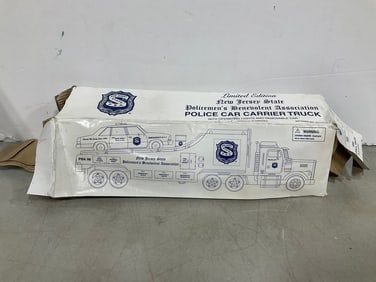 2000 limited edition N.J. Police car carrier truck(new in box)