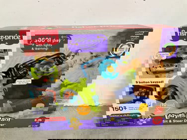 Fisher Price sit and steer driver set(new in box)