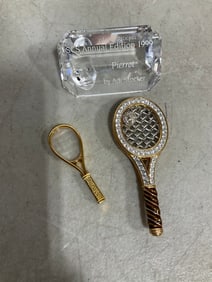 Swarovski crystal, tennis racket brooch, and tennis racket figurine
