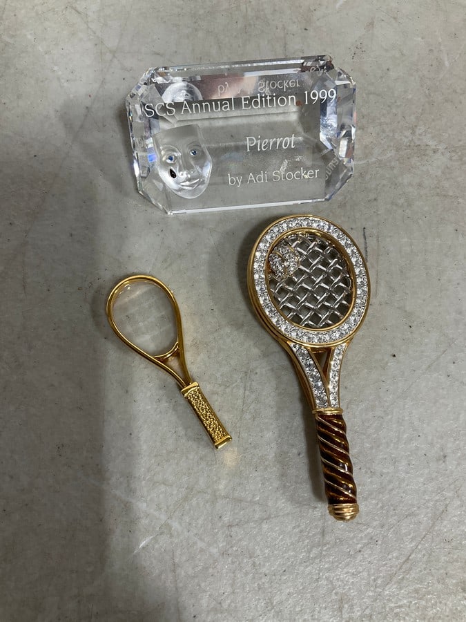 Swarovski crystal, tennis racket brooch, and tennis racket figurine: Swarovski crystal, tennis racket brooch, and tennis racket figurine