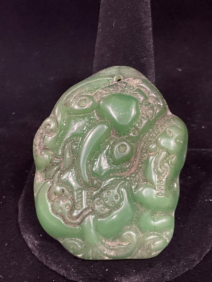 .25 early 1900's oriental carved jade pendant: .25 early 1900's oriental carved jade pendant