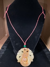 Carved sandstone oriental good luck necklace