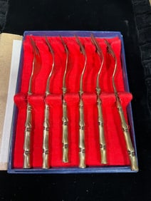 Vintage gold plated forks