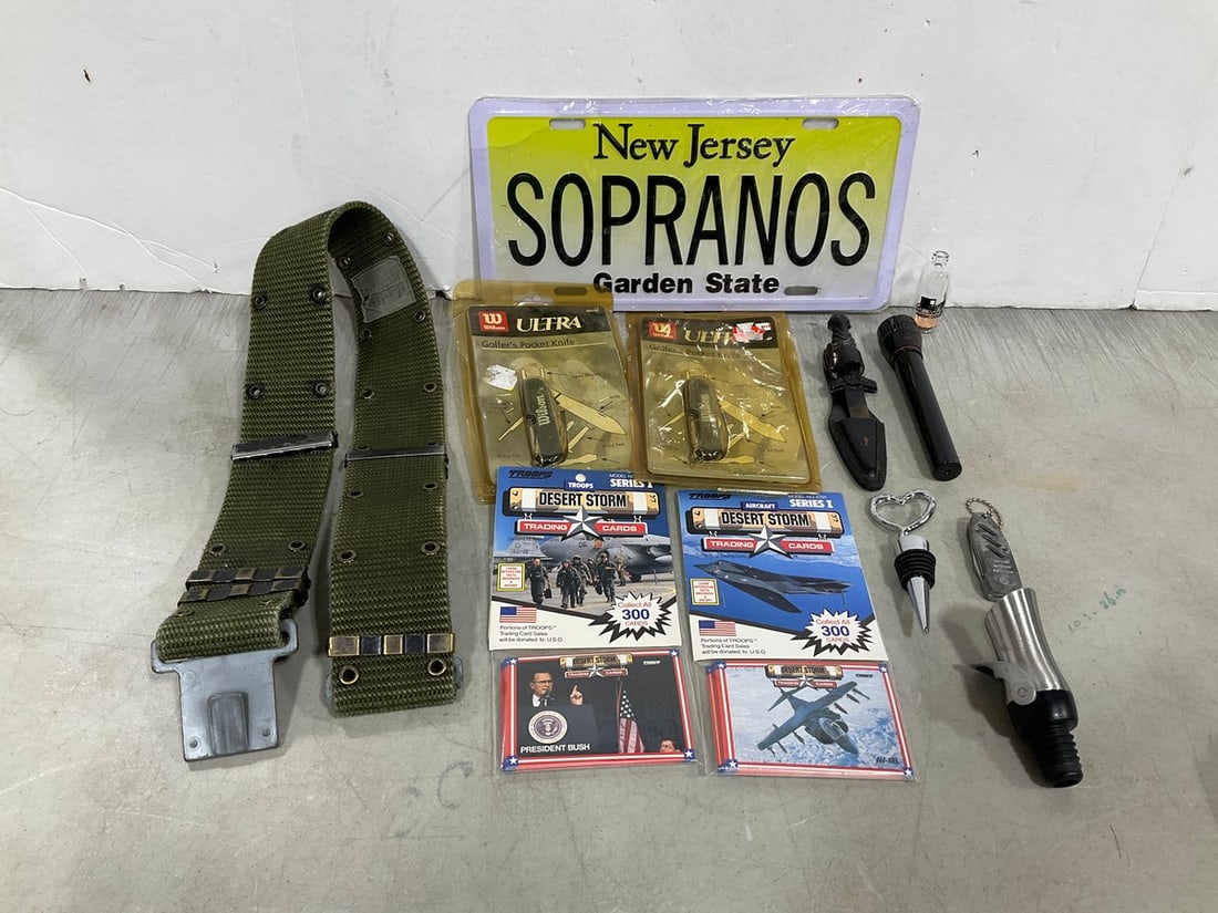 Various pocket knives, military belt(M), sporanos license plate, and more (1 of 1)