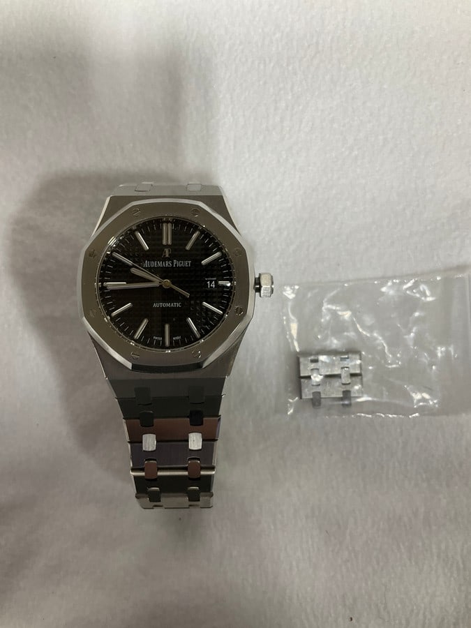 Preowned Audemars Piguet Royal Oak Stainless Steel Black Dial Ref. Ref. 15510ST.OO.07. Came from a (1 of 1)