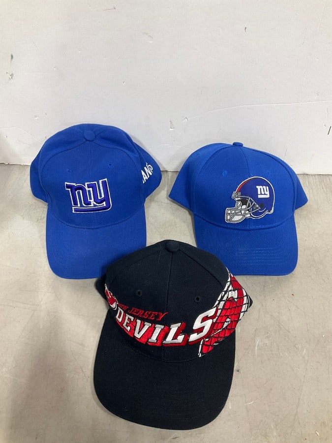 NY Giants and NJ Devils sport caps: NY Giants and NJ Devils sport caps